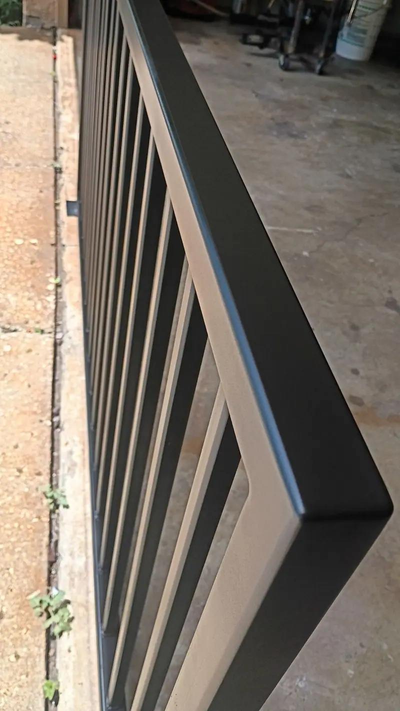 Black square-tube steel railing panel